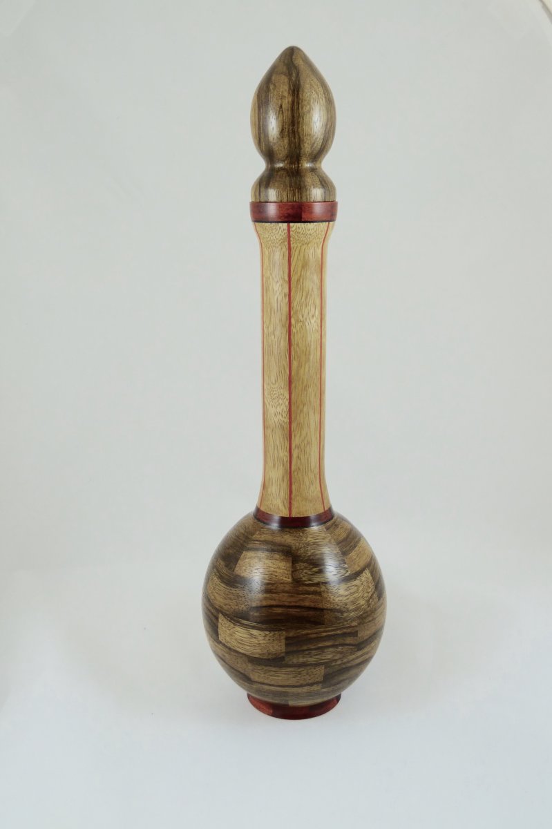 Black and white limba vase with stopper in.