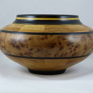 Bowl with camphor burl feature ring.