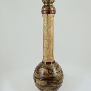 Black and white limba vase with stopper in.