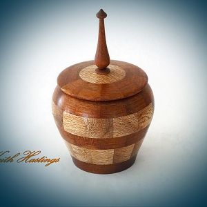 Small lidded bowl turned from Rewa Rewa and Mahogany 90 mm in diameter by 150 mm high.