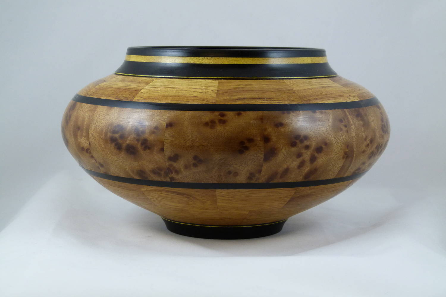 Bowl with camphor burl feature ring.